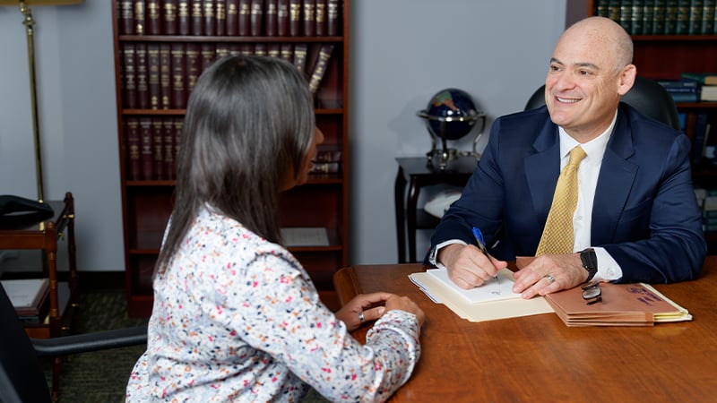 Attoeney Judson L. Pierce with client